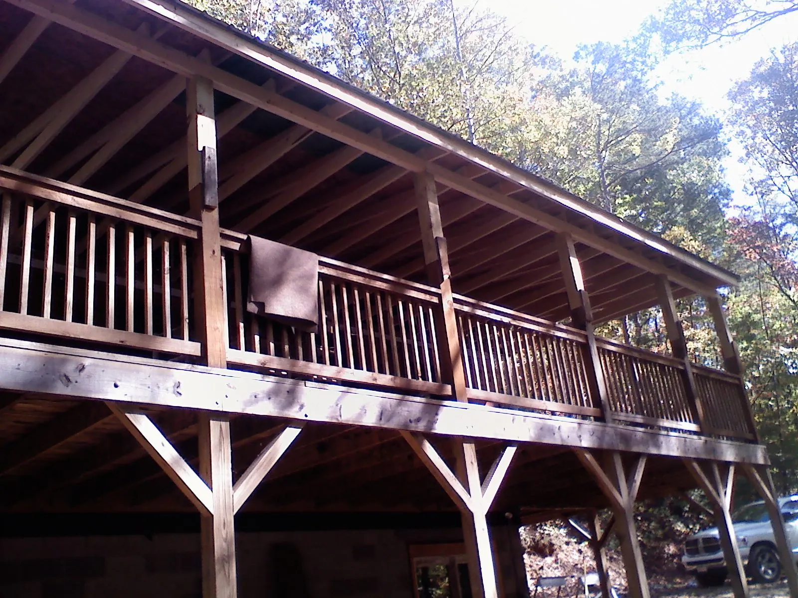 Timber framing under a new elevated porch and deck — Roof Leak Repair in Adena by Roofing Brothers